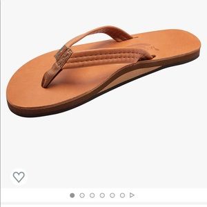 Brand new, never worn Rainbow sandals with narrow strap